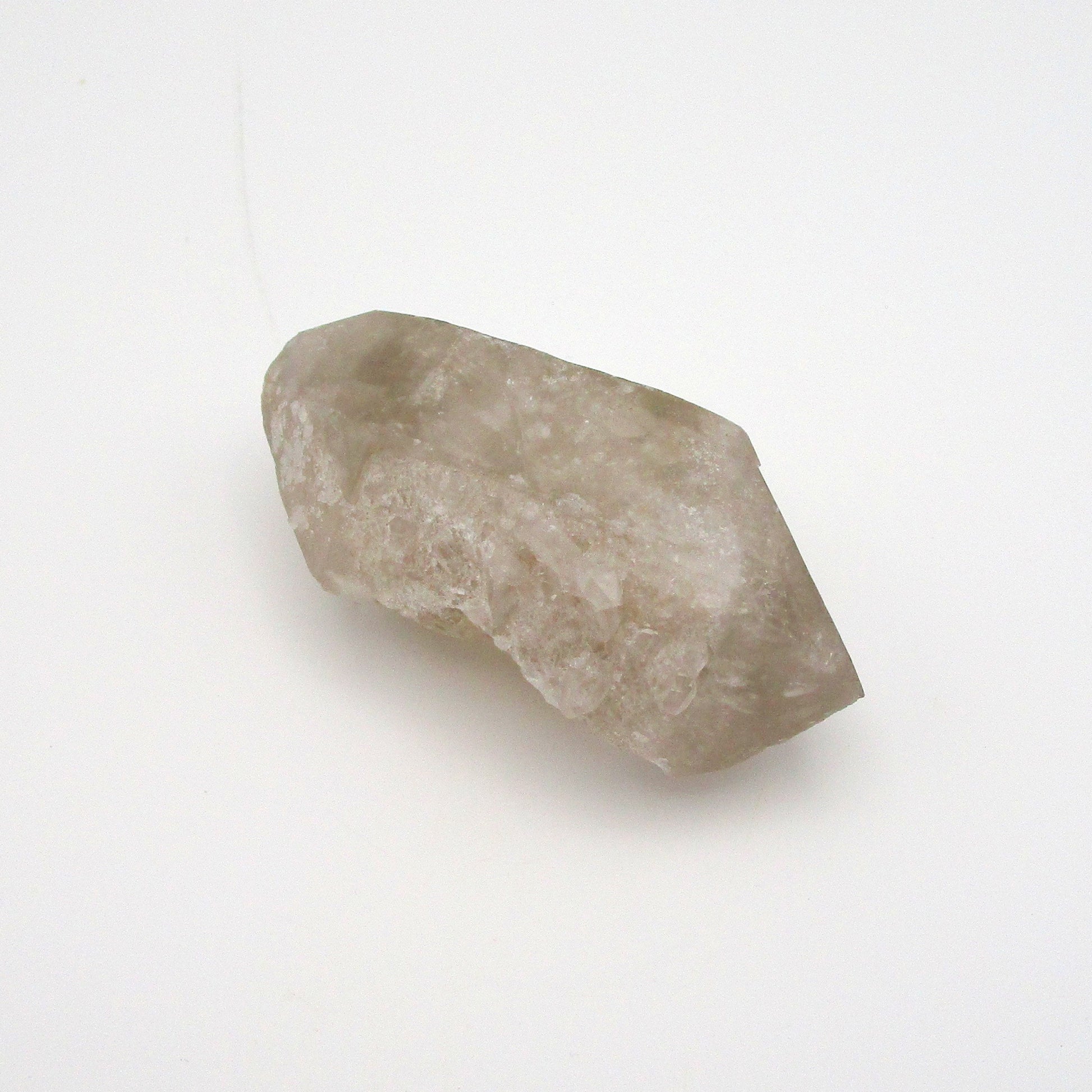 A single Russian Quartz Point on a white background.