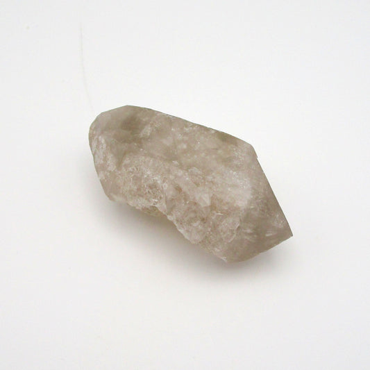 A single Russian Quartz Point on a white background.