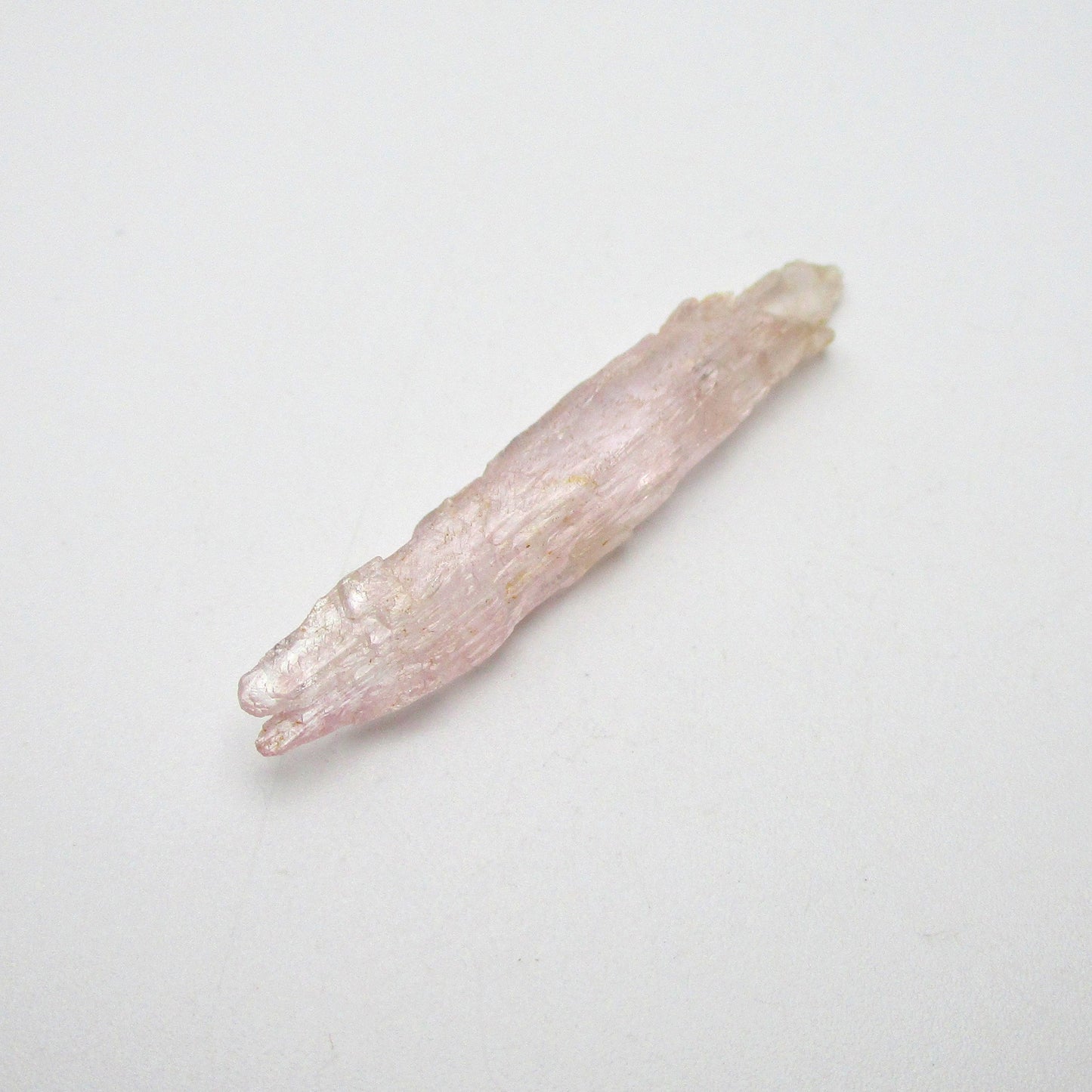 kunzite crystal on white background