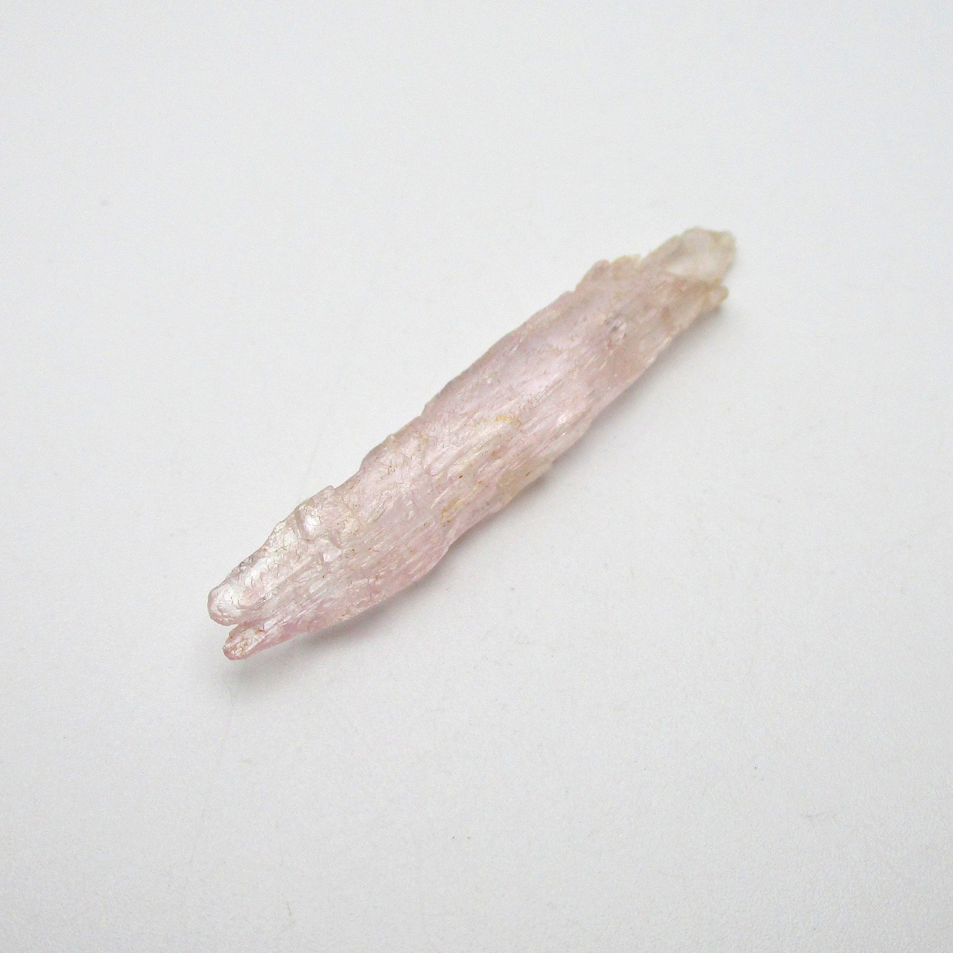 kunzite crystal on white background