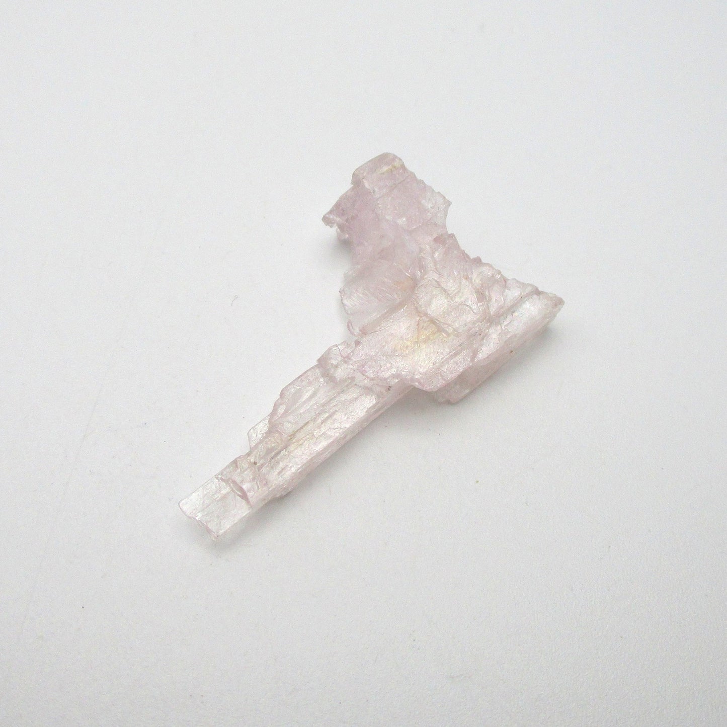 kunzite crystal on white background
