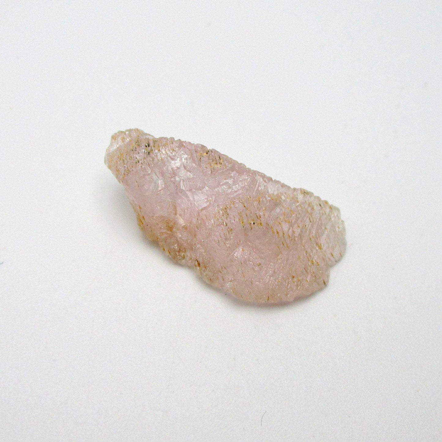 kunzite crystal on white background