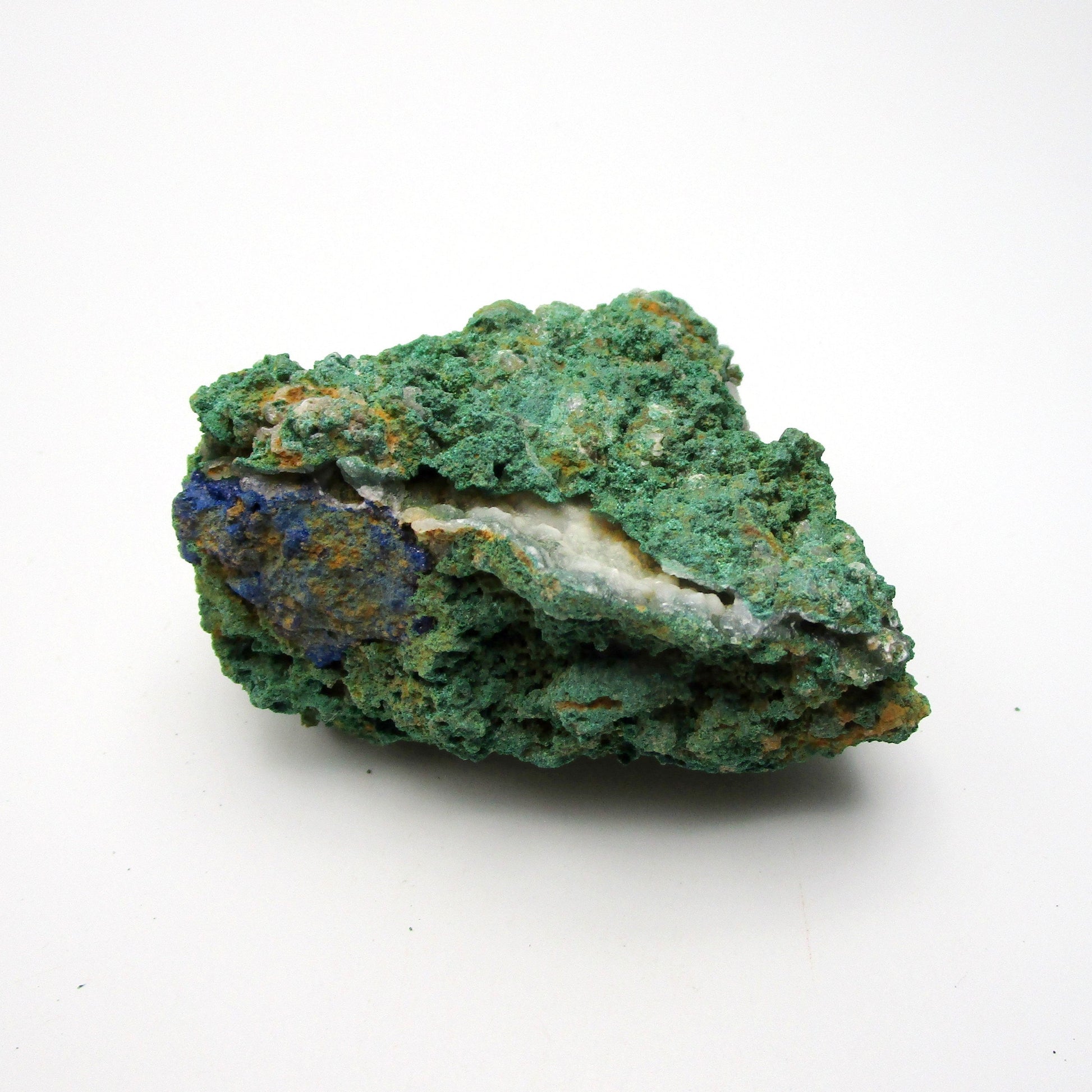 Raw Malachite Specimen on a white background