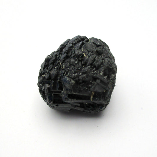 A single palm-sized piece of raw Black Tourmaline on a white background.